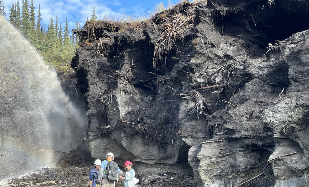 Permafrost image of ground ice and water hitting the exposure.